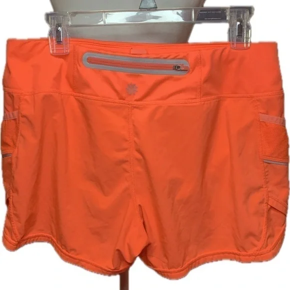 Athleta Ready Set Bright Orange Running Shorts Size Medium - Picture 2 of 8